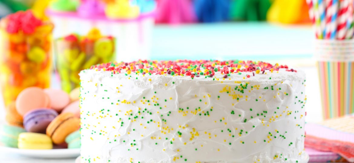Birthday-cake-on-colorful-background-min