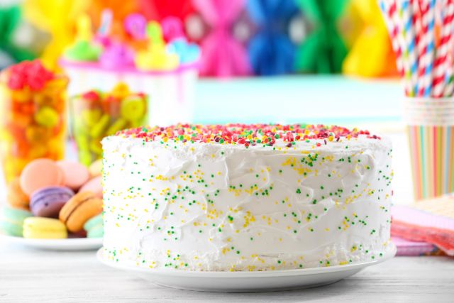 Birthday-cake-on-colorful-background-min