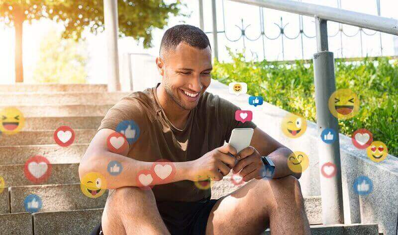 emoji ubersetzer ein Mann mit Handy skrivanek gmbh