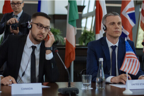 Interpreting two translators wearing headphones skrivanek gmbh