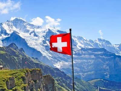Welche Sprache spricht man in der Schweiz Fahne skrivanek